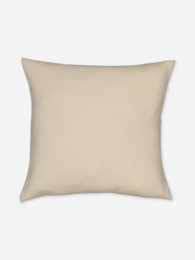 Cream cushion knitted in regenerated cashmere