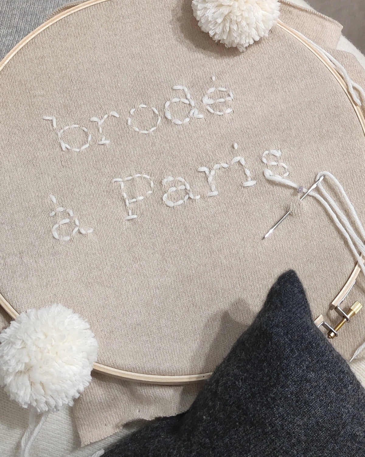 Cashmere hand-embroidered in Paris with needle and thread