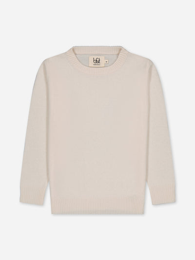 Ivory kid sweater knitted in regenerated cashmere.