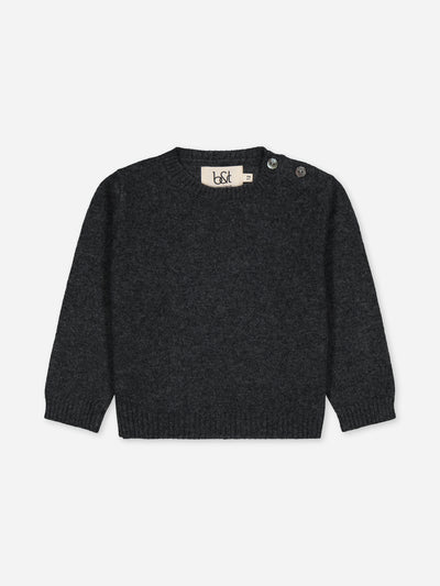 Notre pull bébé anthracite tricoté en cachemire régénéré